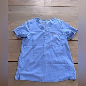 Figs ceil blue one pocket scrub top. Size medium.